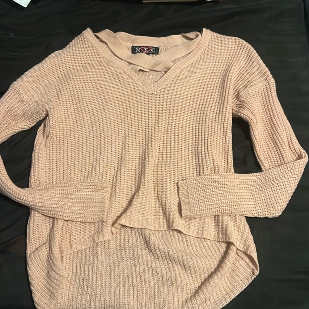 Pink knitted sweater